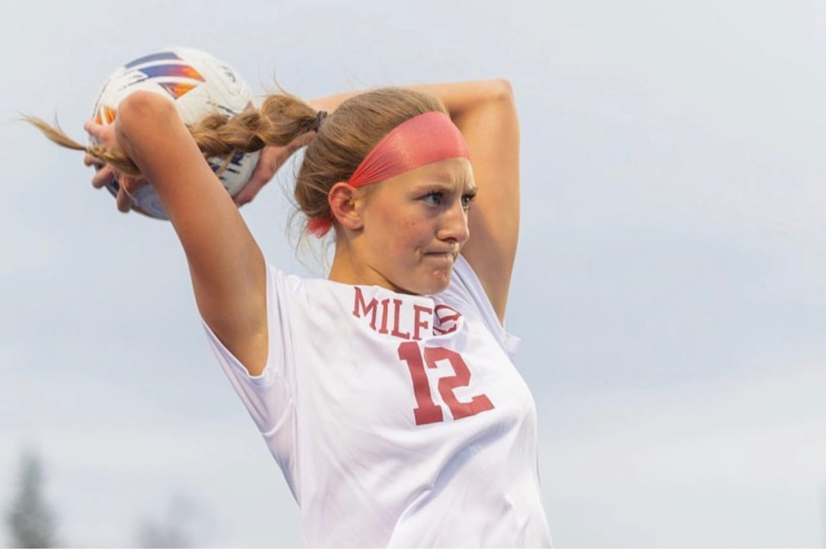 Deep throwing the ball into play during her junior year soccer season. 

Photo Courtesy of Jerry Rea.