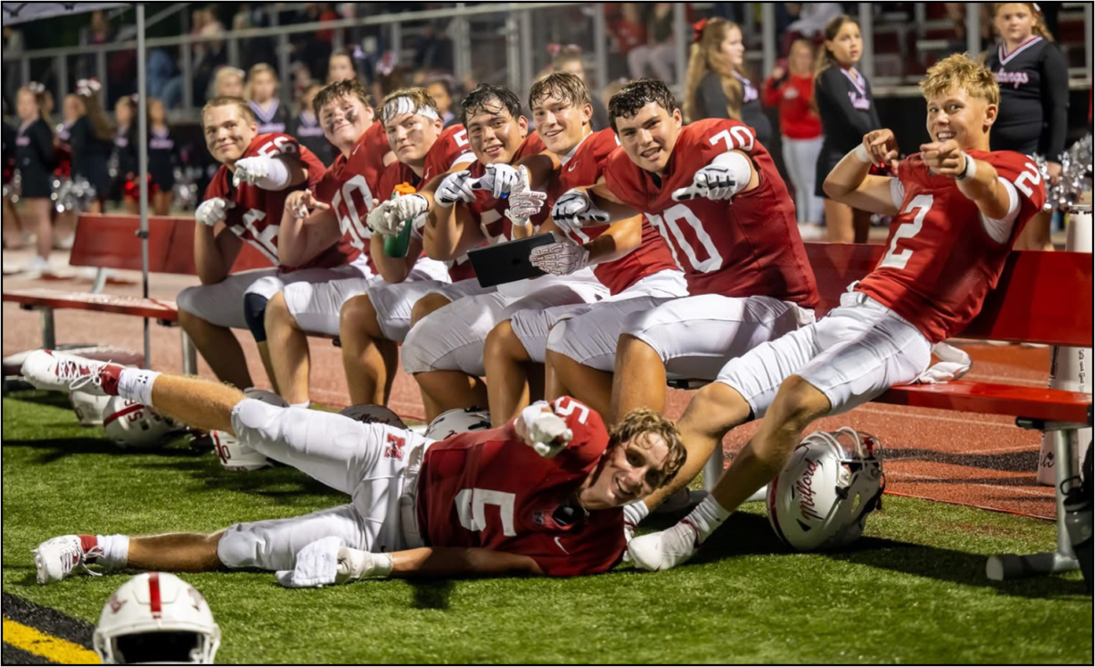 (Listed in order from left to right) Tyler Frankovich, Dean Baker, Ben Vanderlist, Jordan Ladach, John Short, Aiden Mecklenborg, and Hutson Smith. (At the bottom) Caden Johnston-Thompson celebrating after a drive that ended in a touchdown.